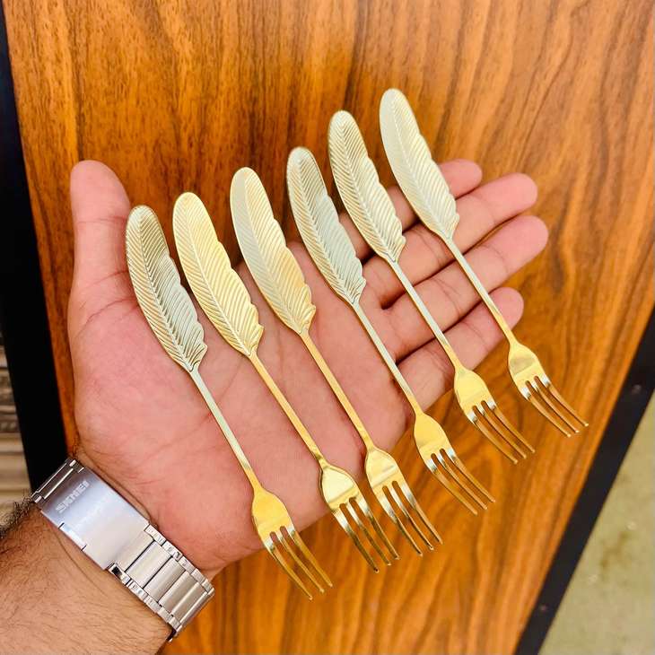 صورة طقم شوك ومعالق الحلويات